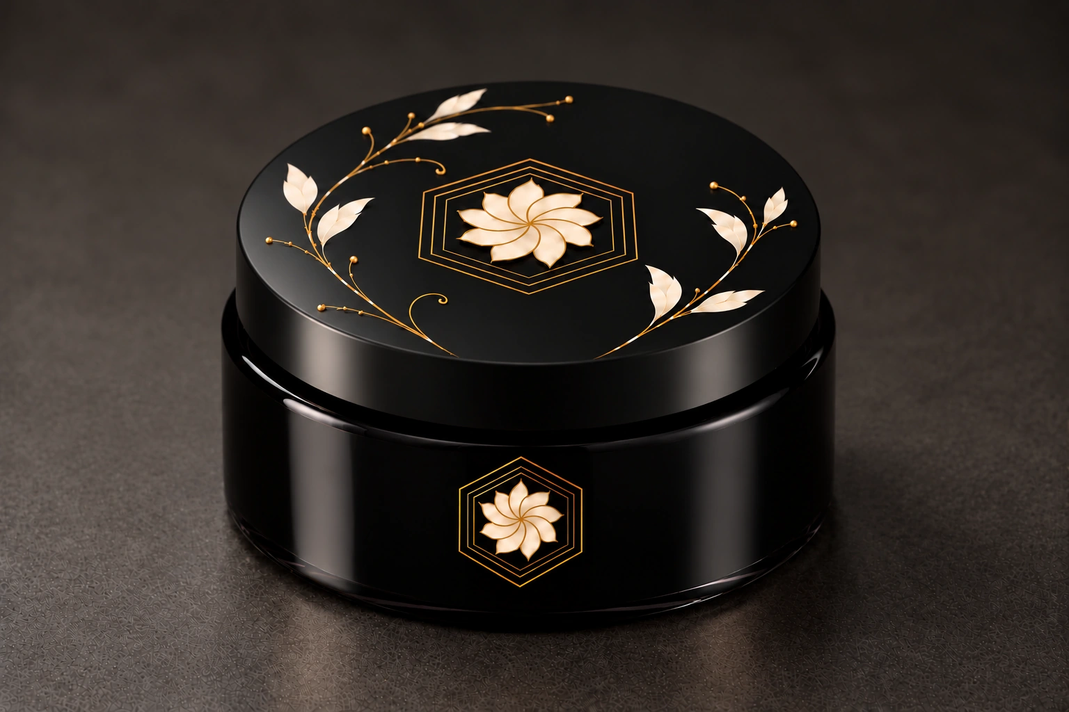 Refined black glass Harmonic Touch vessel with a single gold and ivory emblem on the body and botanical lid artwork